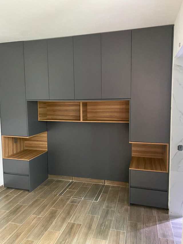 Cabecera envolvente en antracita y nogal — Recámaras con Closet, Cocinas & Closets Stylo
